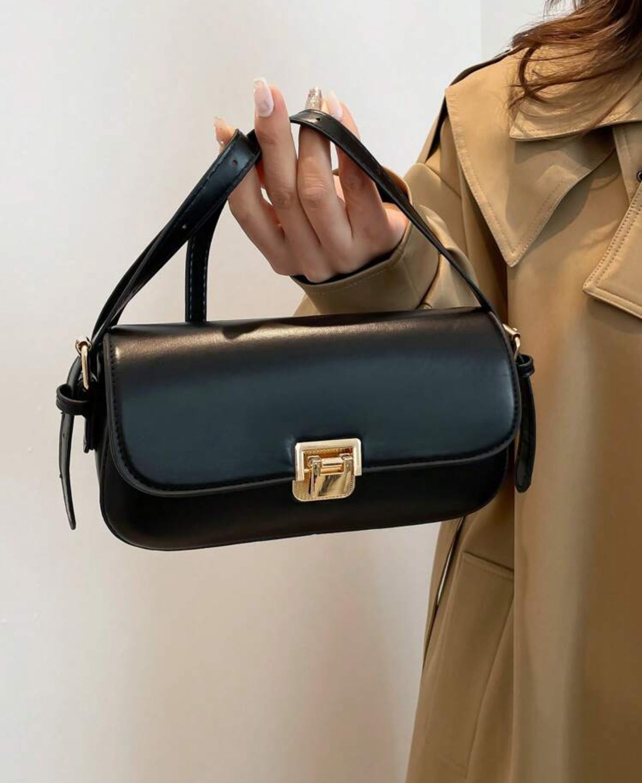 sac a main noir classe